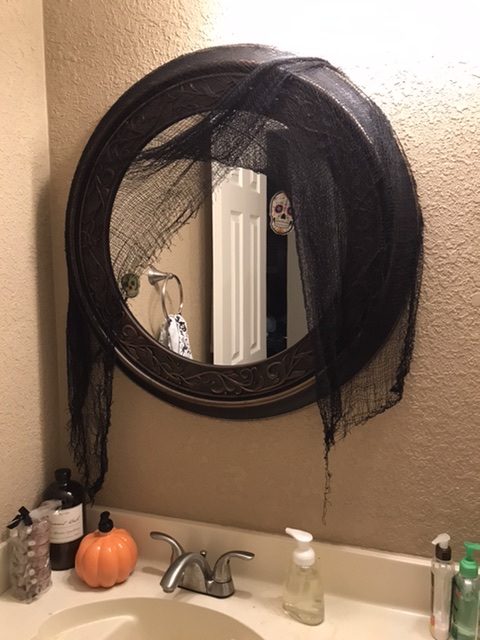 Creepy cloth around mirror
